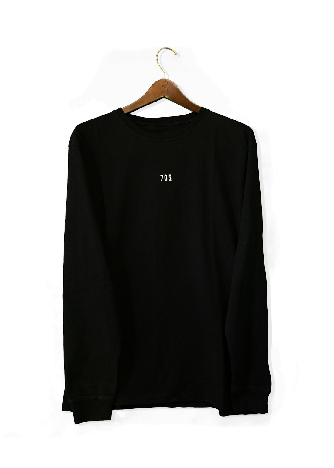 Black long-sleeve tee on hanger white background; small 705 chest branding
