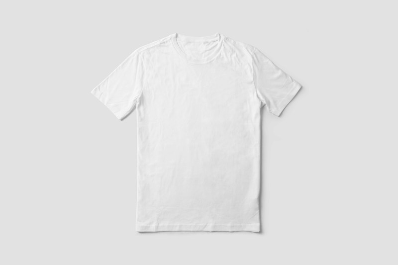 Plain white tee front on pale gray background